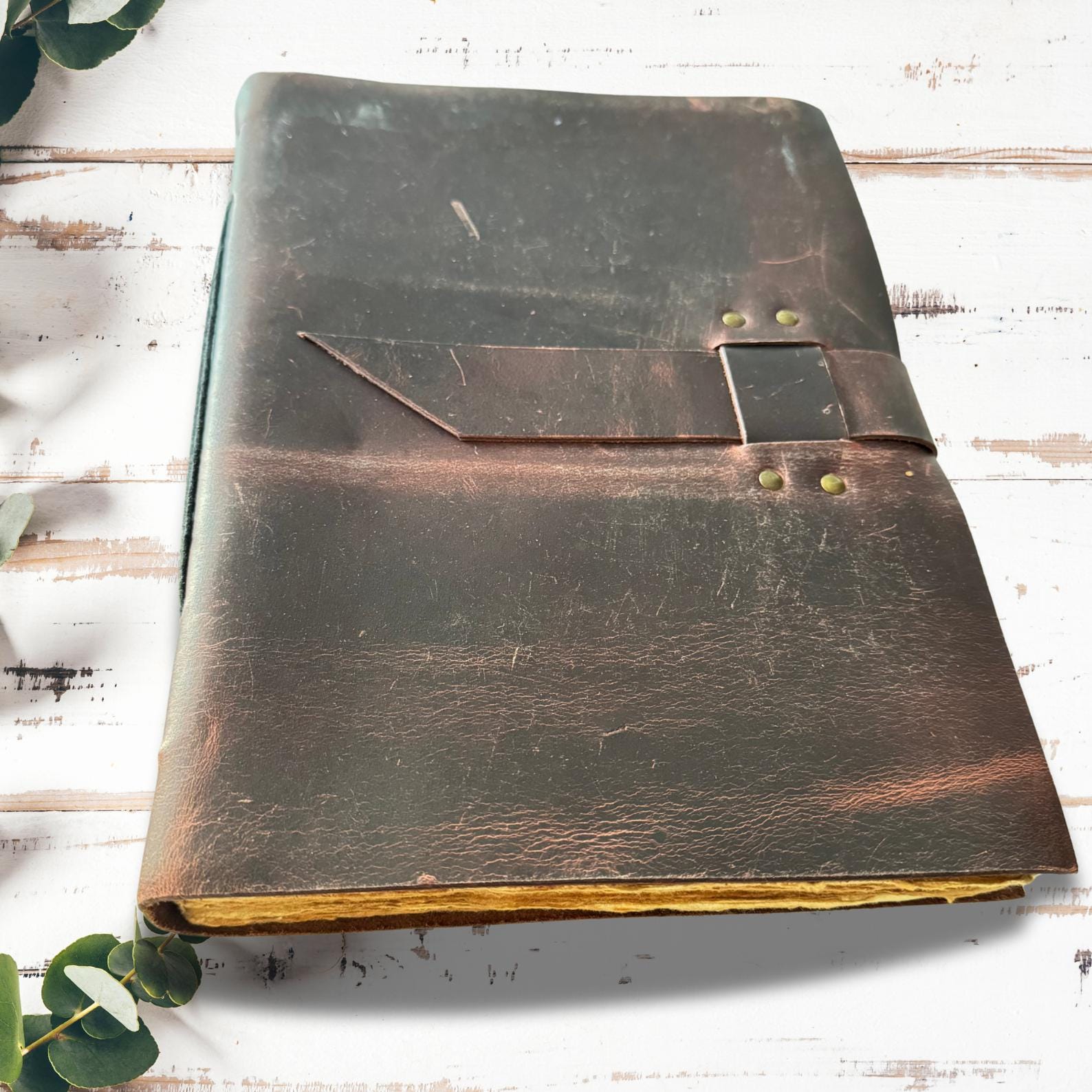 Brown Leather Sketchbook on a white asthetic background