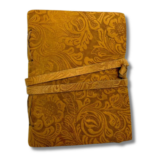 Brown Leather Sketchbook with leather strap on a white background