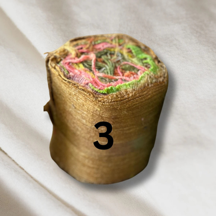 a roll of brown Recycled Silk Noil Ribbon