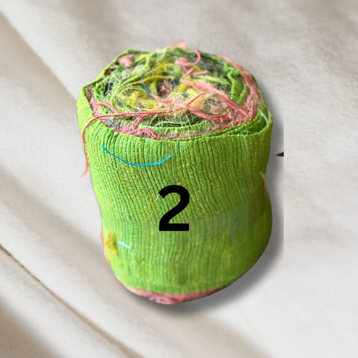 a roll of light green Recycled Silk Noil Ribbon