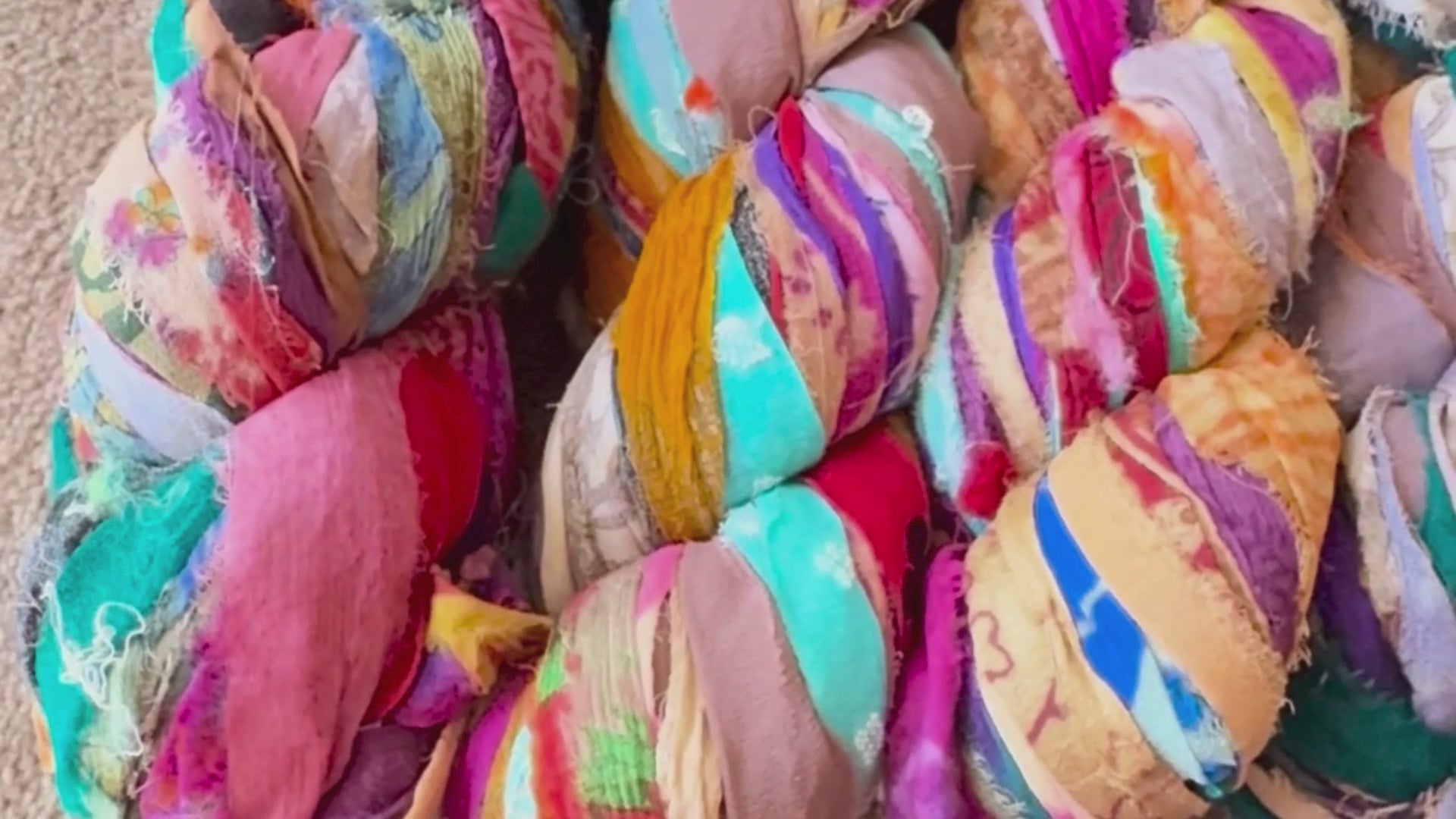 Showing close up of embroidered trim in a video