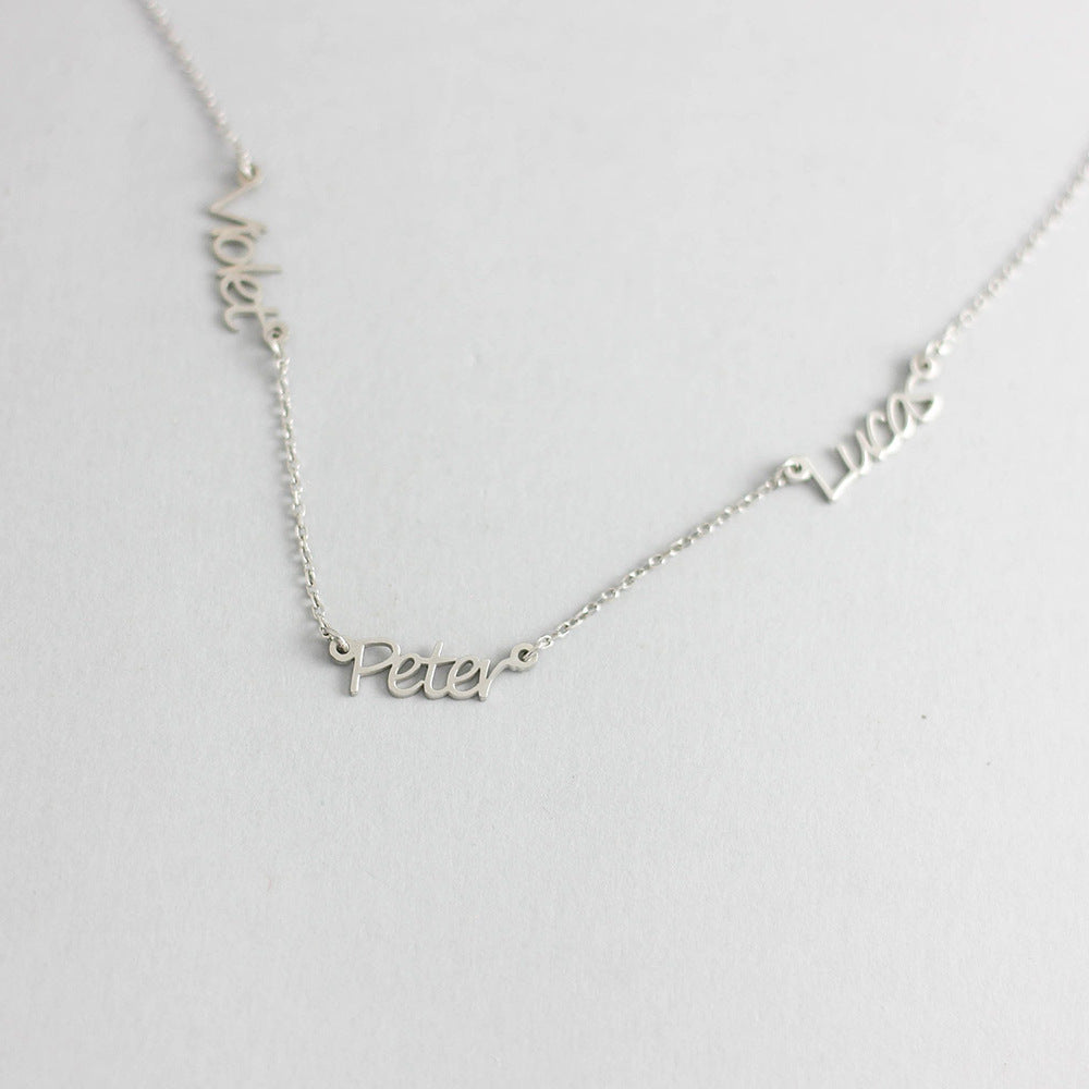 Alma personalised necklace name silver with 3 names Violet, Peter And Lucas on a white abckground