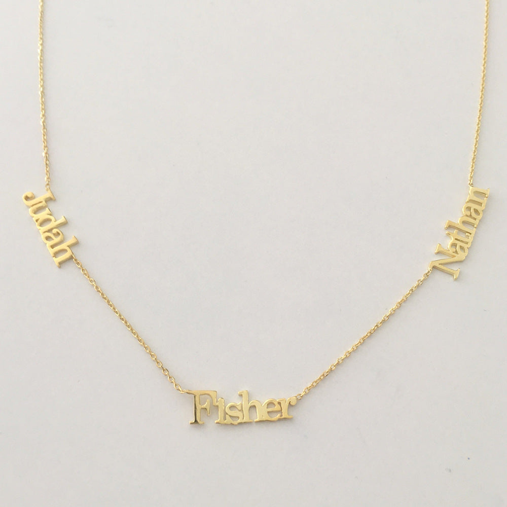 Alma multiple name necklace in gold with 3 names Judah, Fisher and Nathan.