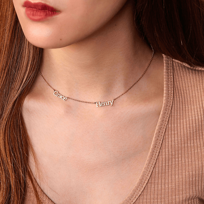 A woman wearing custom necklace Australia with 2 names in rose gold