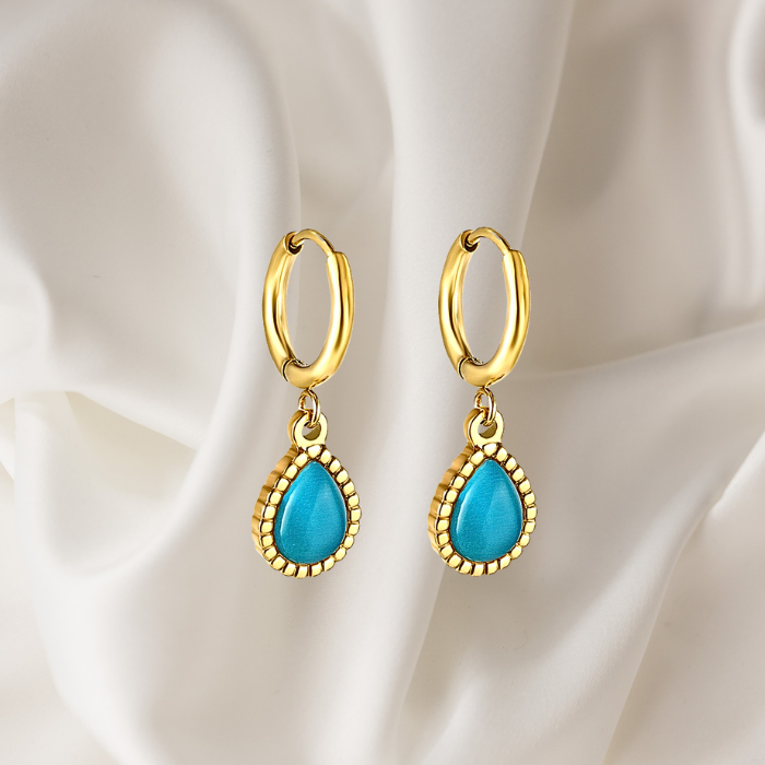 Ellery Minimalist Gold Plated Blue Earrings on satin fabric