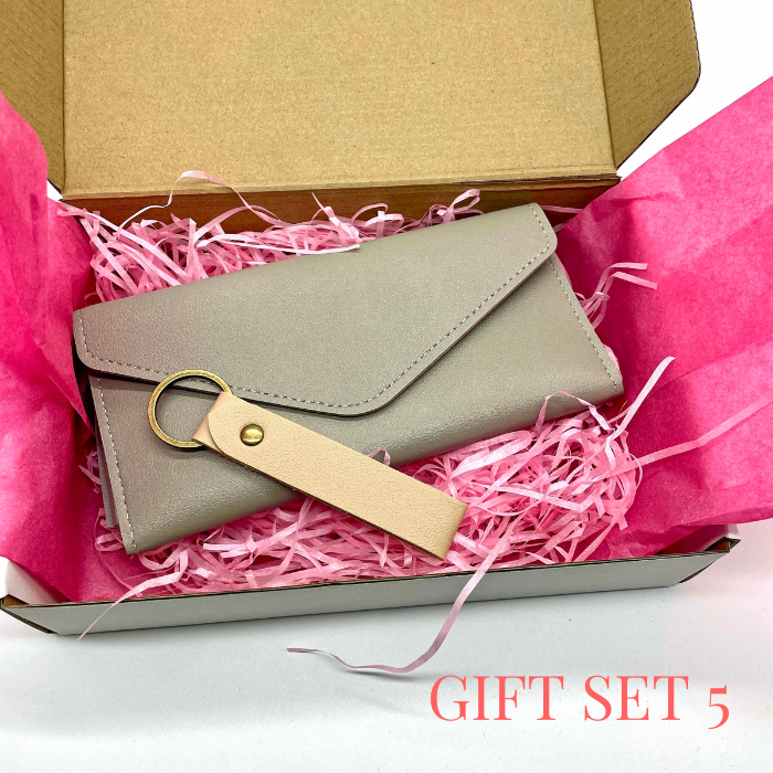 Silver Mist  leather wallet and leather keychain beautiful packed in a gift box with pink tissue paper and tissue shreds.