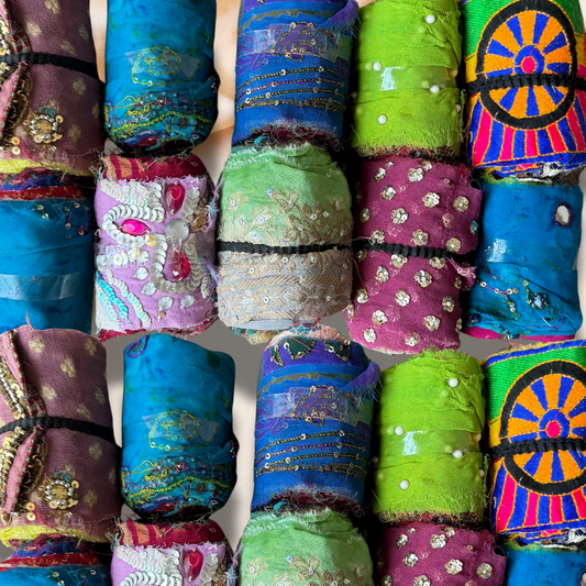  Assorted Embroidered Sari Silk Ribbon close up on a white background 