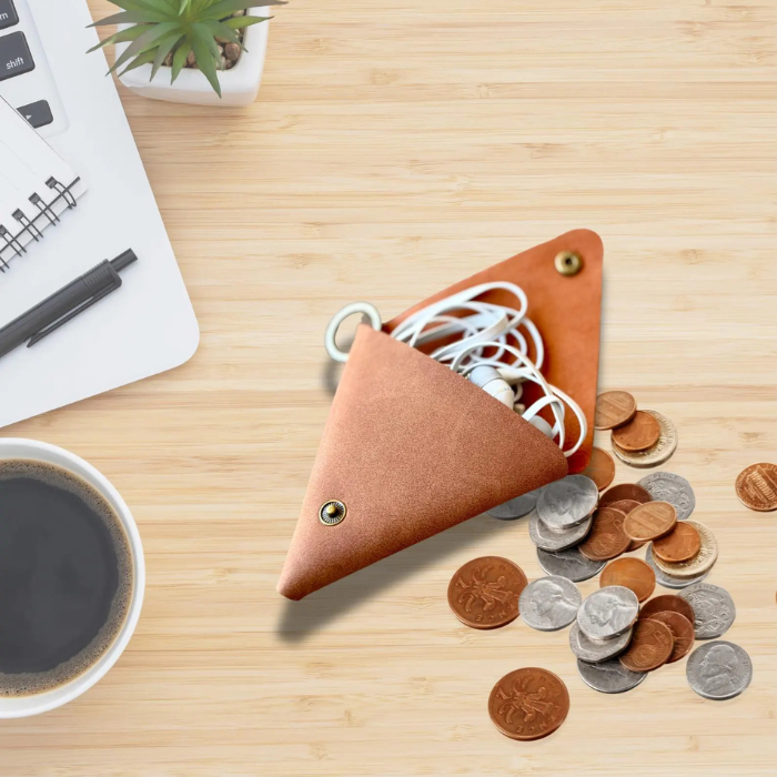 Showing the Tan (Brown) Juno headphone bag with headphone and coins