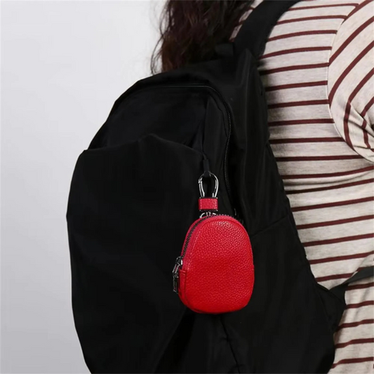 Woman carrying her personalised leather purse on her bag