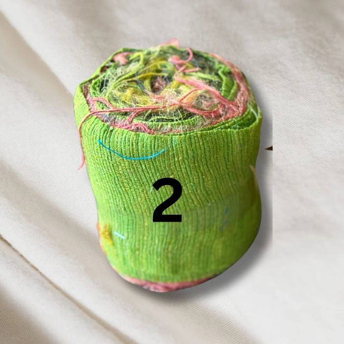 a roll of light green Recycled Silk Noil Ribbon 