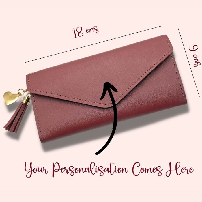 Personalisation details on fuchsia leather wallet