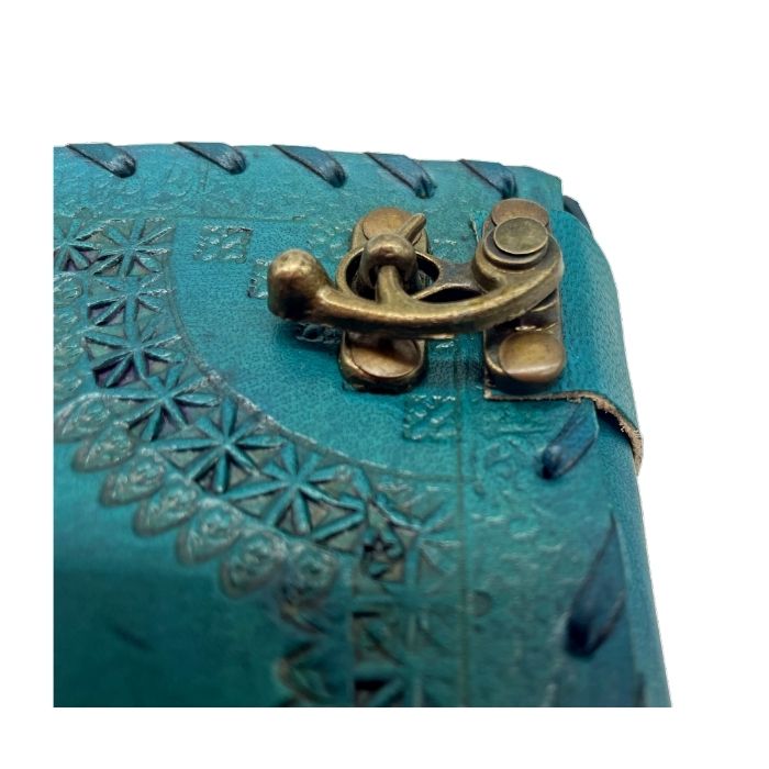 Close up of Leo handmade journal with brass lock.